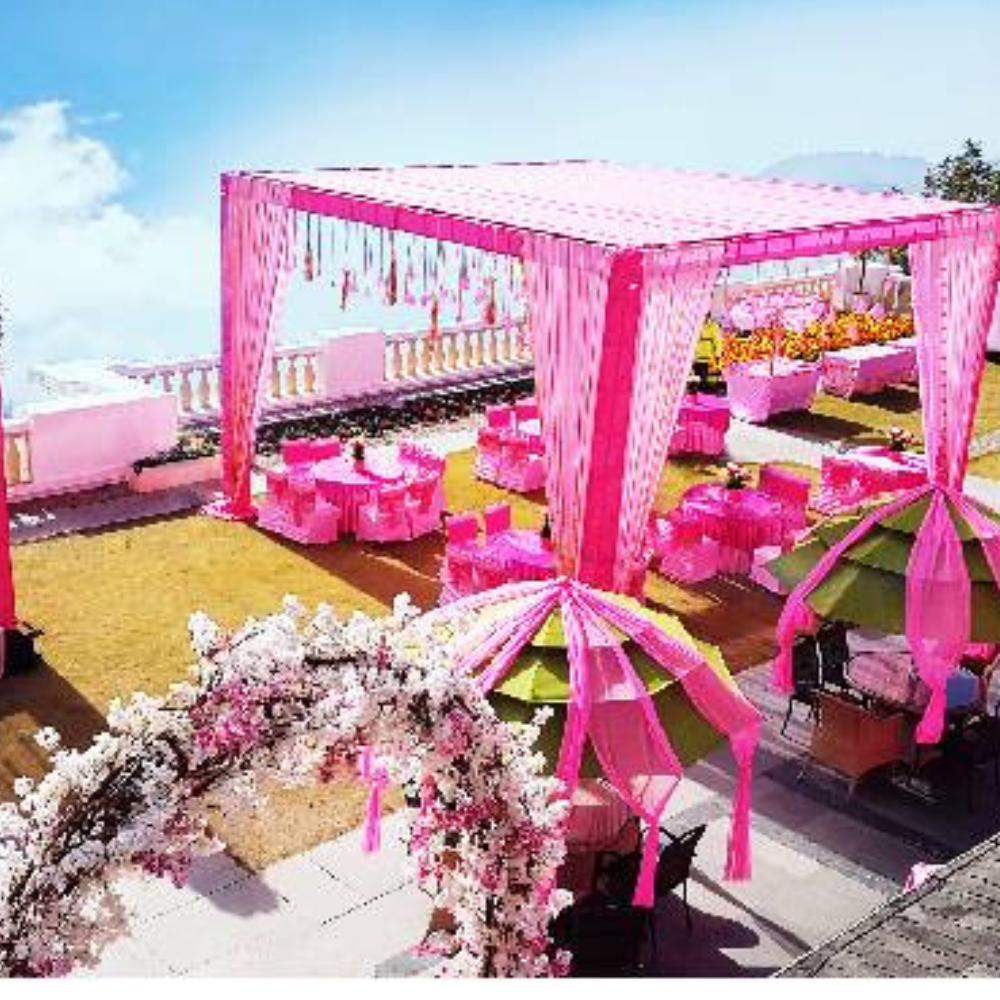Hilltop pink wedding decoration with mountain skyline &mdash; SnazzyTrips Mussoorie